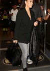 Kim Kardashian In Jeans Catching a Flight at MIA